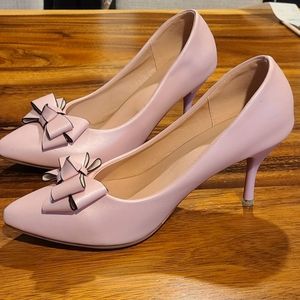 Pink pumps with bow